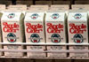 Photo of apple cider containers at Delicious Orchards