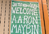 Photo of a poster welcoming NY Jets player Aaron Maybin