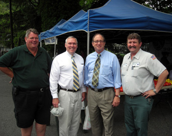 Photo of Kurt Alstede, Al Murray, Secretary Fisher and Dale Davis