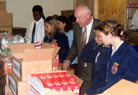 Photo of Secretary Kuperus and FFA members at the Salvation Army in Plainfield