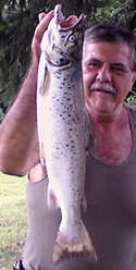 Angler with salmon