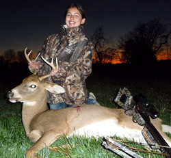 Youth hunter with buck