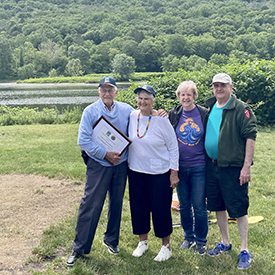 The Shawnee Inn's Charlie & Ginny Kirkwood (1st & 2nd from L), pose for a photo after receiving the Sojourn's High Admiral Award. Photo by the DRBC.