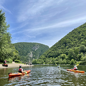 Sojourners approach Kittatinny Point. The Delaware Water Gap is in the background. Photo by the DRBC.