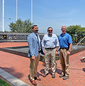 (From L to R) EPA Region 3 Admin. Adam Ortiz, DRBC Exec. Dir. Steve Tambini & DNREC Secretary Shawn Garvin grab a photo in front of the Veterans' Memorial. Photo by the DRBC.