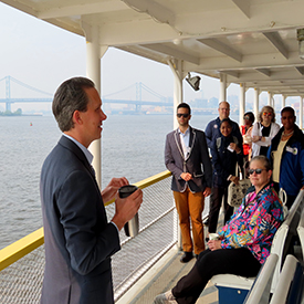 Camden Community Partnership's Joe Myers talks to attendees about efforts to redevelop Camden's waterfront into a series of parks and trails. Photo by the DRBC.
