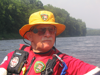 Image of Dick Rhodes providing safety on the Delaware River.