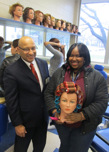 NJ State Board of Education President Arcelio Aponte tours the cosmetology lab at Union County Vocational Technical Schools.