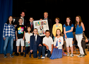 Harrington-Park-students-present-Acting-Commissioner-Cerf-with-a-special-print