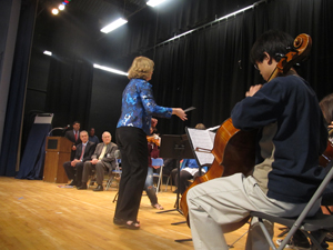 The-Harrington-Park-orchestra-performs-during-the-school-assembly,-under-the-direction-or-music-teacher-Lisa-Woods
