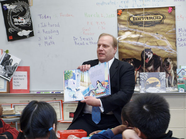 DOE Chief of Staff Dave Hespe reads to 4th graders at the Bartle Elementary School in Highland Park.