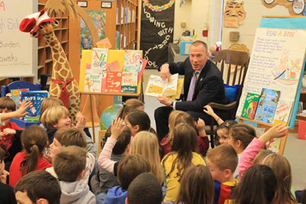 Department of Banking and Insurance Acting Commissioner Ken Kobylowski reads to the second grade class at Shrewsbury Borough School, in Shrewsbury.