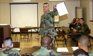 SSG Katkicks gives instruction to troops