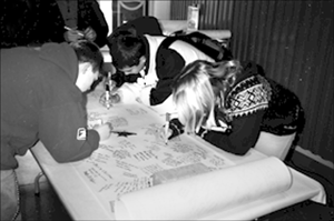 Kids signing scroll\