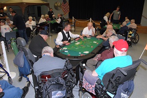 A group of residents playing card during Casino Night at Vineland Memorial Home