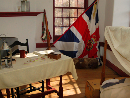 An officer's bedroom - The King's colors were donated to the Museum by Queen Elizabeth