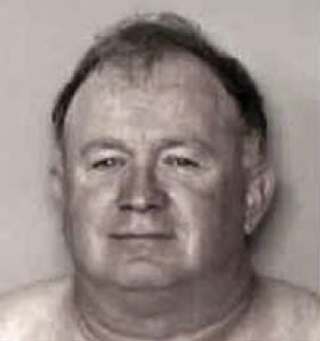 John E. Schlump