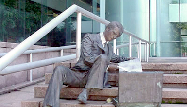 law- themed sculptures are scattered throughout the grounds of the Hughes Justice Complex
