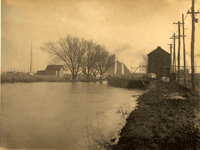 "The Canal flowing into Newark Bay at Newark." [looking east toward Lock 20 East; lock tender's house at right]