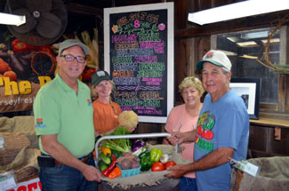 Photo of Secretary Fisher with Carolyn and Art Brown and Jennifer LaMonaca