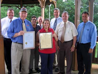 Photo of Greg McGuckin, Secretary Kuperus, Frank Capone, Dennis Poane, Deputy Under Secretary Houston, Mike Redpath, Mayor Brush, Freedholder Vicari