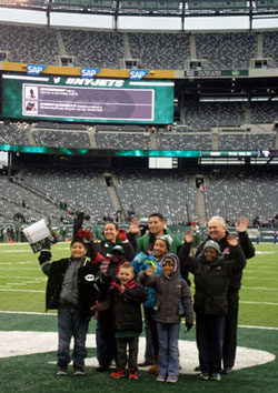 Roosevelt School group on the field at the Jets game