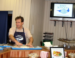 Photo of Joe Myers doing a fish demo