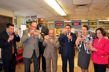 Photo of officials tasting Jersey Fresh berry yogurt parfaits.