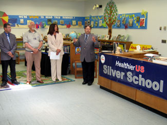 Photo of Jim Harmon, Rose Tricario, Mayor Fressola and Jeff Hanaway