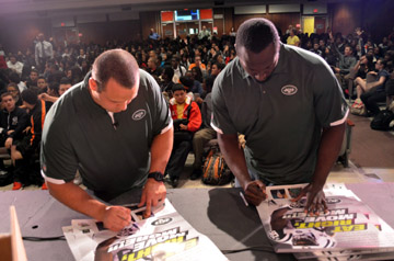 Photo of Mike DeVito and Muhammad Wilkerson