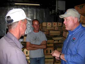 Photo of John and Ryan Ploch with Secretary Kuperus 