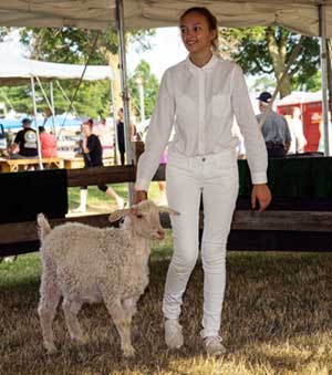 Photo of Rebecca showing her sheep