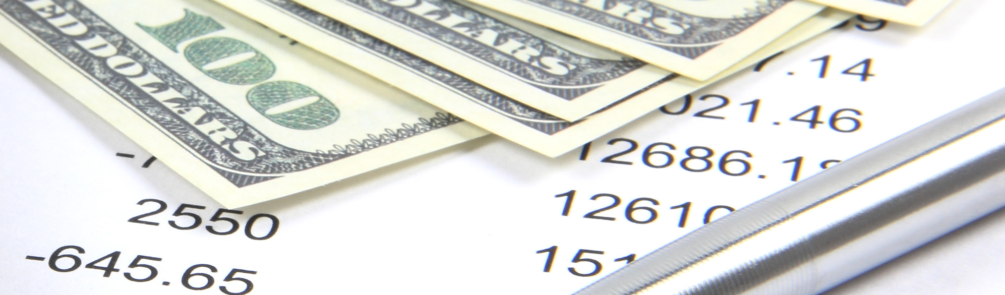 Photo: Pen and Money on Paper