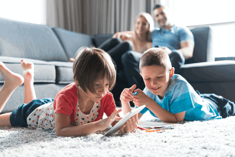 brother 7 sister reading  ipads