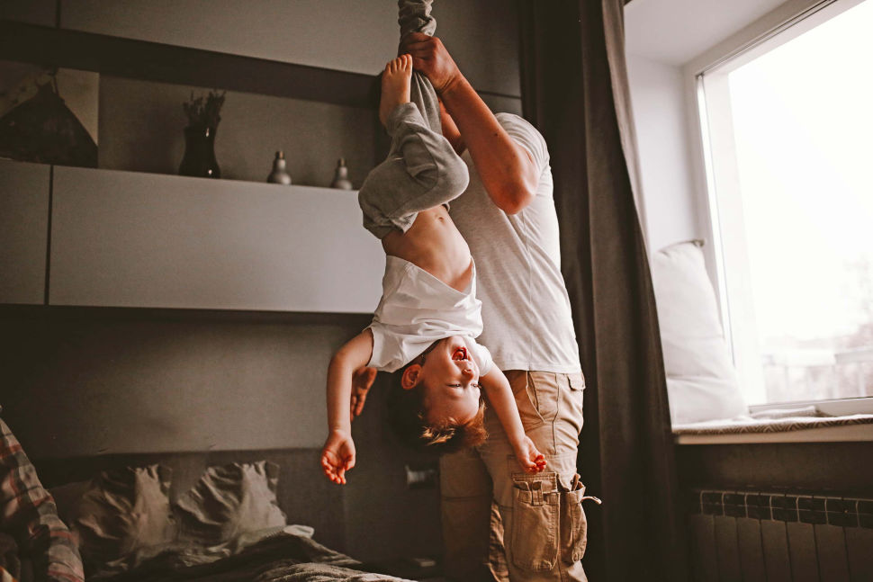 father playing with son