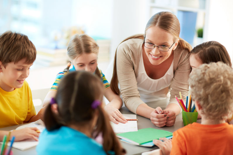 teacher talking to students