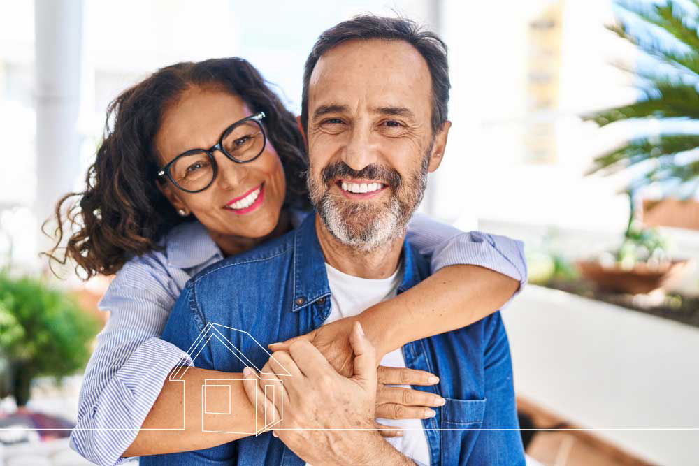 older retired couple embracing