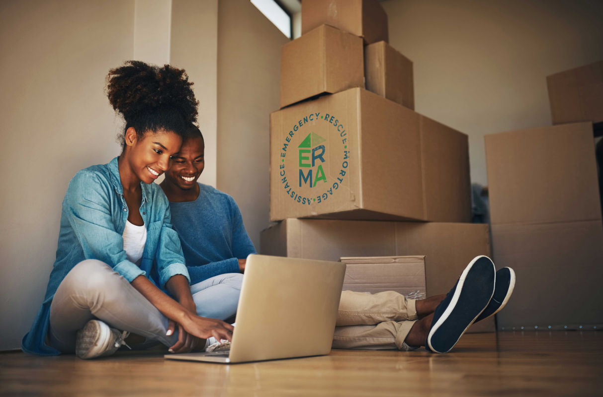 Couple viewing a laptop computer 