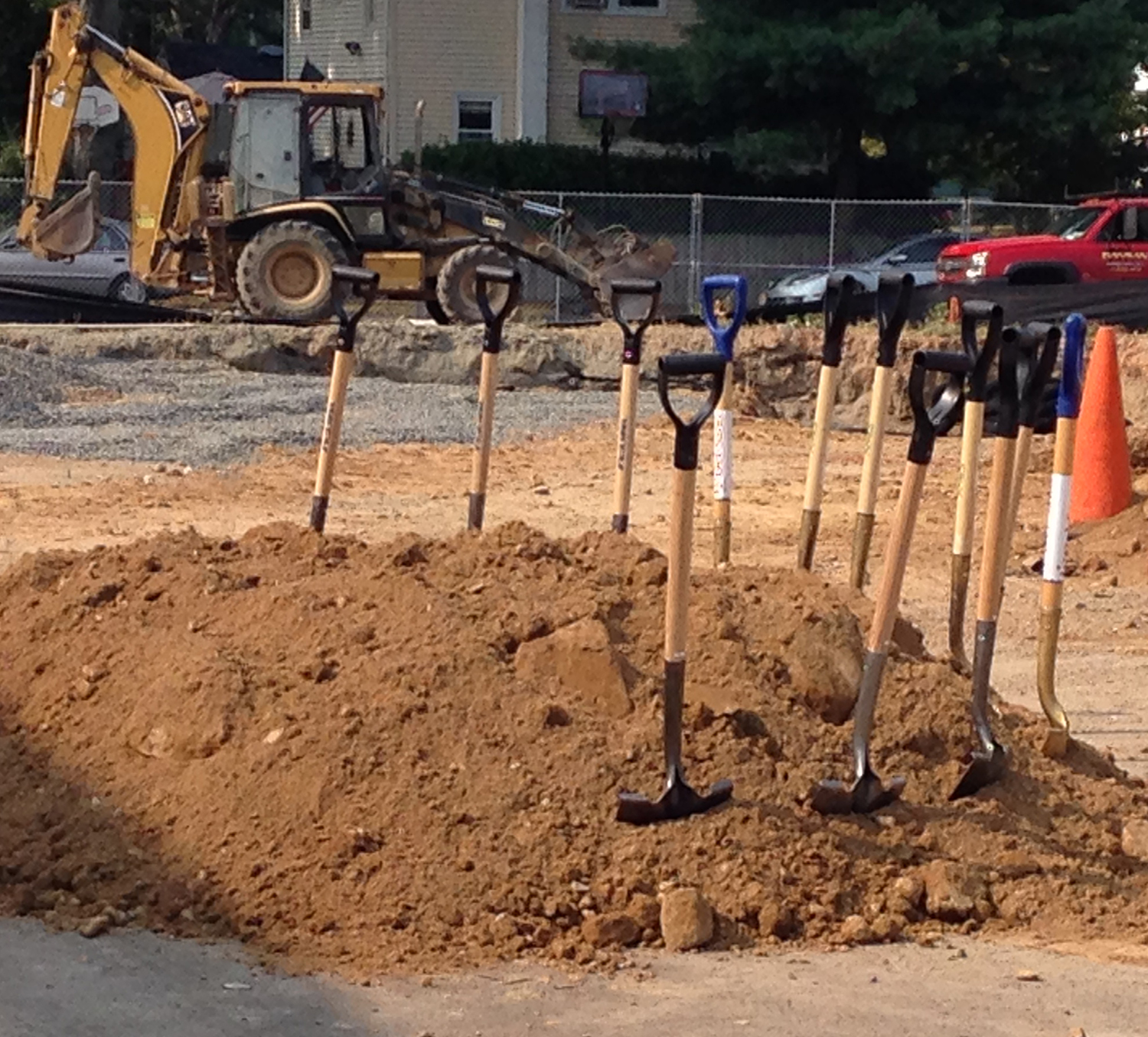 Shovels are stuck in the ground.
