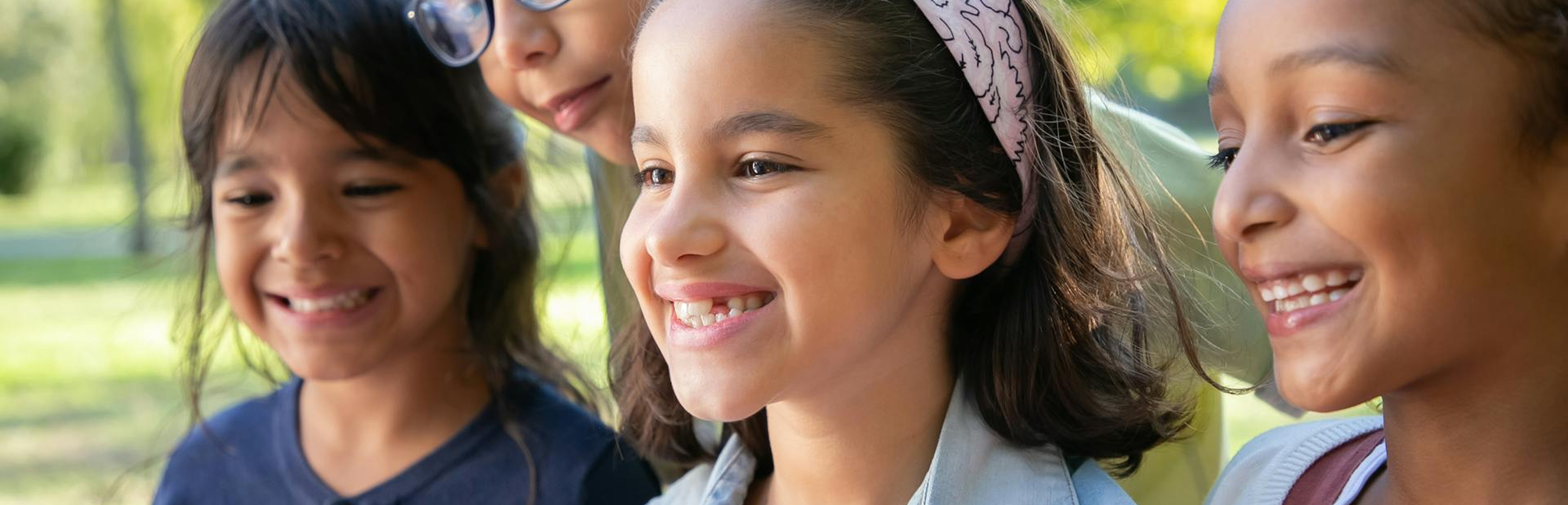 A group of children smiling