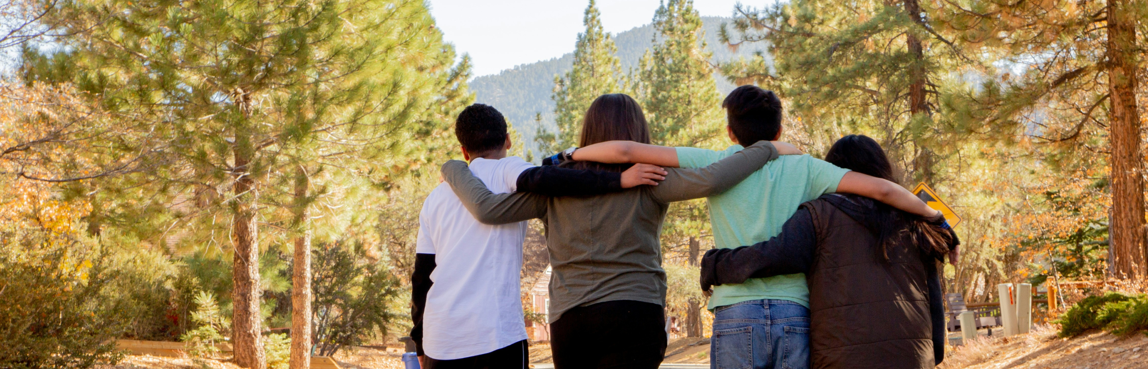 A group of teens supporting each other