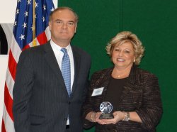NJDEP Commissioner Bob Martin and Patricia Swannack, Vice President for Administrative Services, Monmouth University (Accepting award on behalf of President Gaffney)