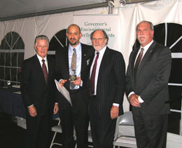 Eric Stiles of New Jersey Audubon receiving a Healthy Ecosystems Environmental Excellence Award from Governors Florio and Corzine and NJDEP Acting Commissioner Mauriello.