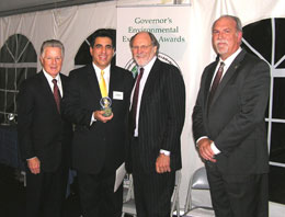 Middlesex County Freeholder H. James Polos receiving Middlesex County's Sustainable & Healthy Communities Environmental Excellence Award from Governors Florio and Corzine and NJDEP Acting Commissioner Mauriello.