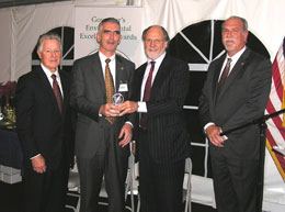 Ivor MacLeod of Hoffman LaRoche receiving a Clean Air Environmental Excellence Award from Governors Florio and Corzine and NJDEP Acting Commissioner Mauriello.