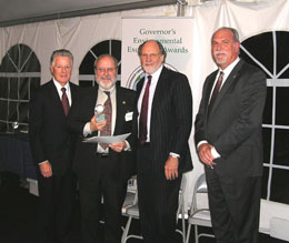 Michael Catania of Conservation Resources, Inc. receiving an Environmental Excellence Award for Land Conservation from Governors Florio and Corzine and NJDEP Acting Commissioner Mauriello.