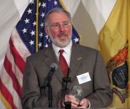 Rowan University President Dr. Donald J. Farish accepts the Clean Air award. 