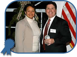 NJDEP Commissioner Lisa Jackson awards the Governor's Environmental Excellence Award for contributions to Clean & Plentiful Water to Donald Correll, President & CEO of American Water-Applied Water Management of Hillsborough for its beneficial reuse of reclaimed water at the Homestead Development in Mansfield Township.