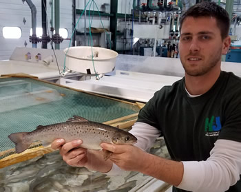 Nick Ruberto with a salmon bound for Merrill Creek Reservoir