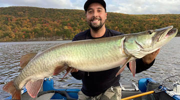 Angler with muskie